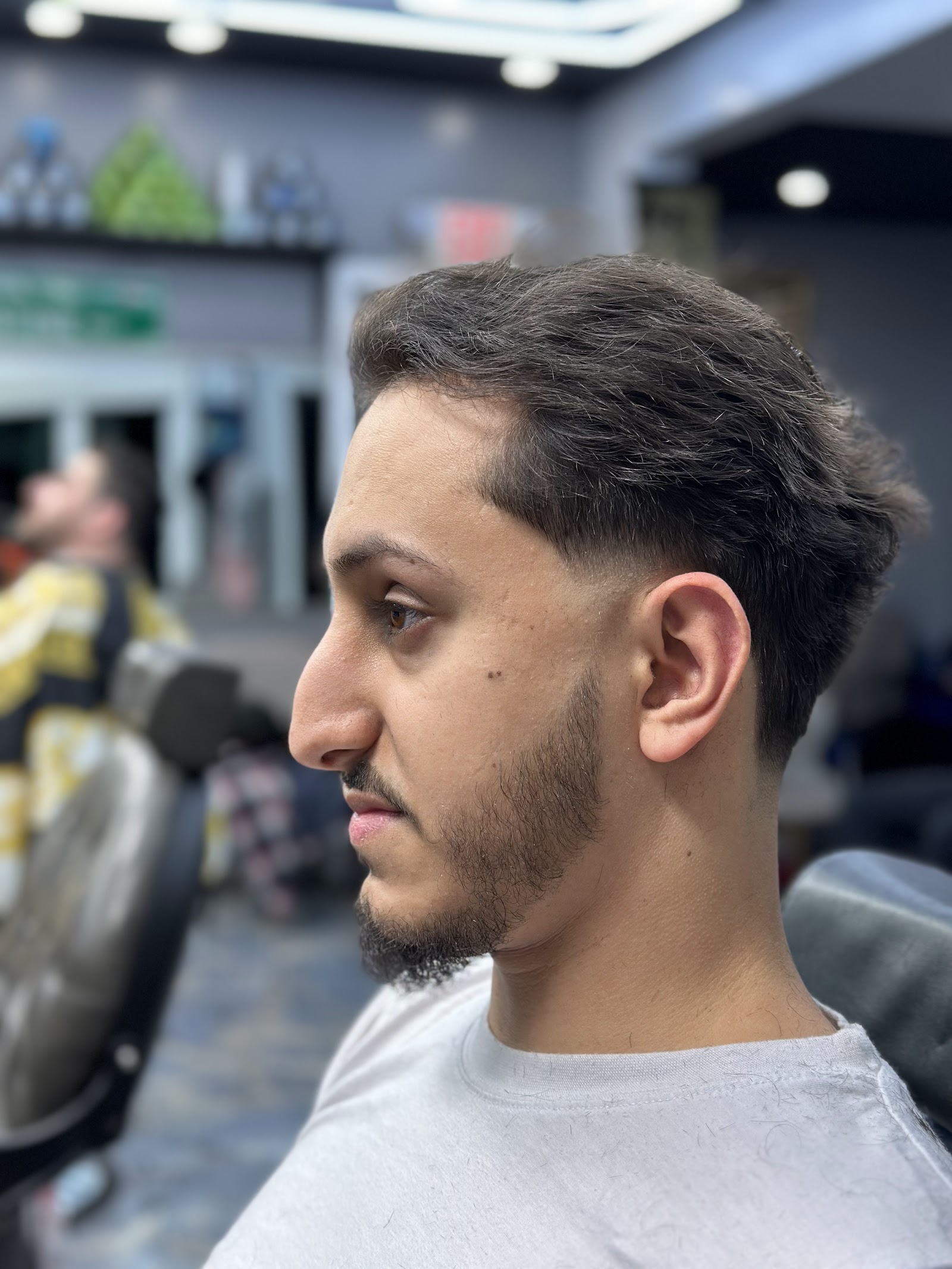 Tapered scissor cut in profile
