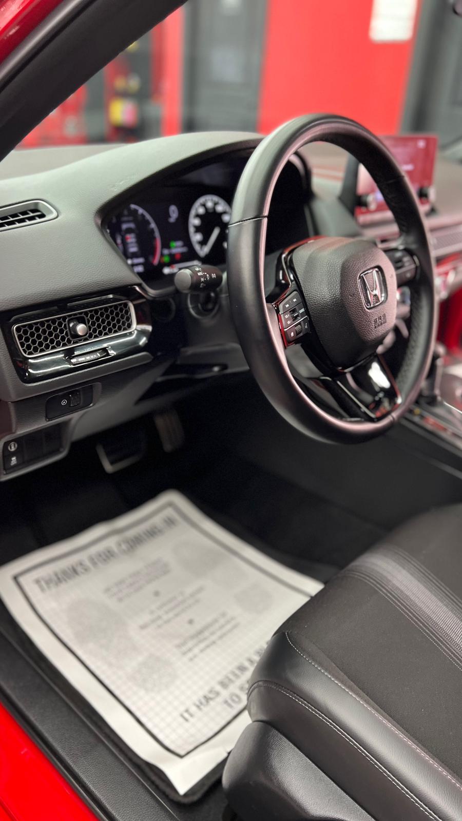 Interior after a full reset — clean leather, dash, wheel