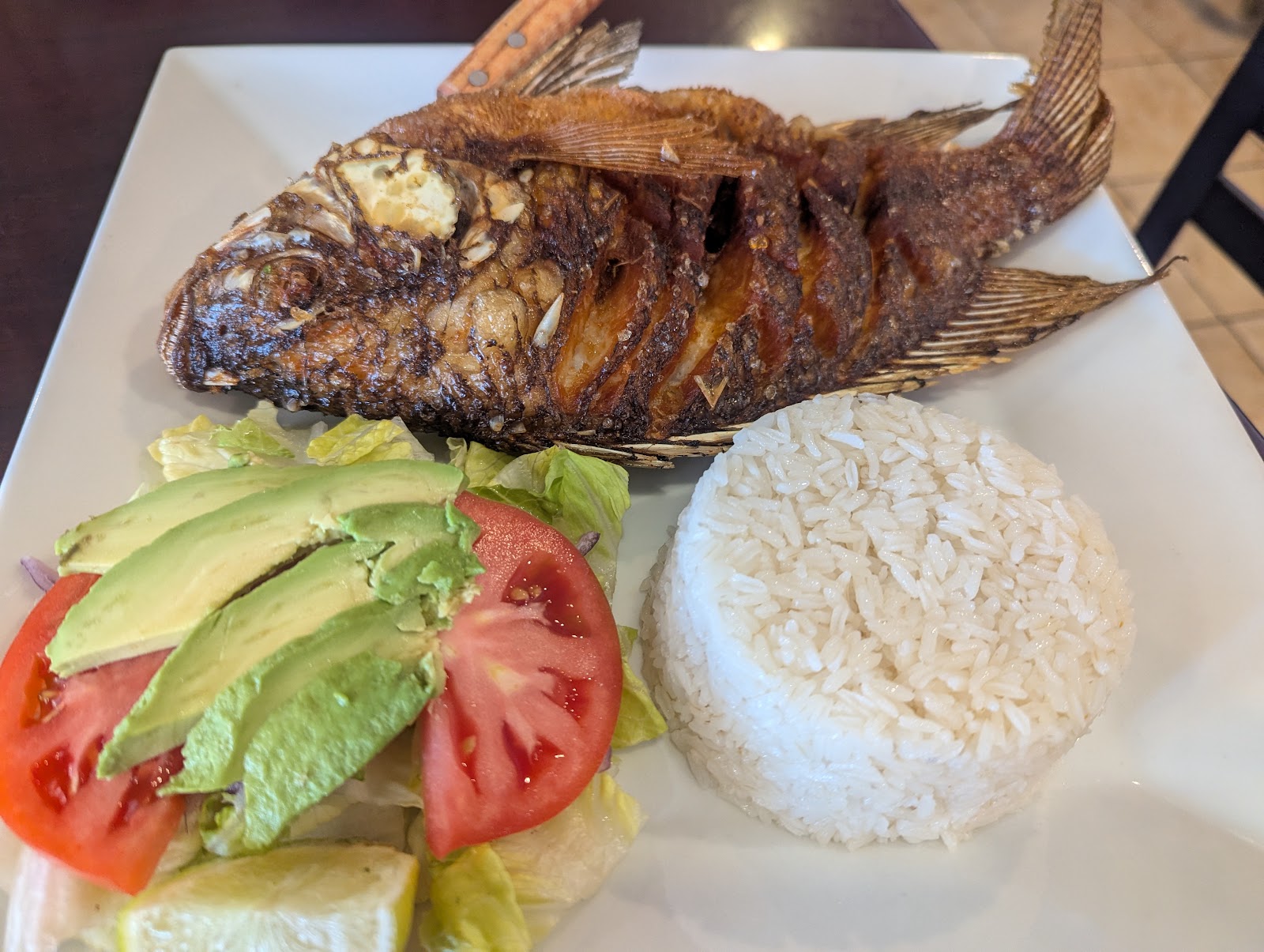 Whole fried red snapper at La Catedral